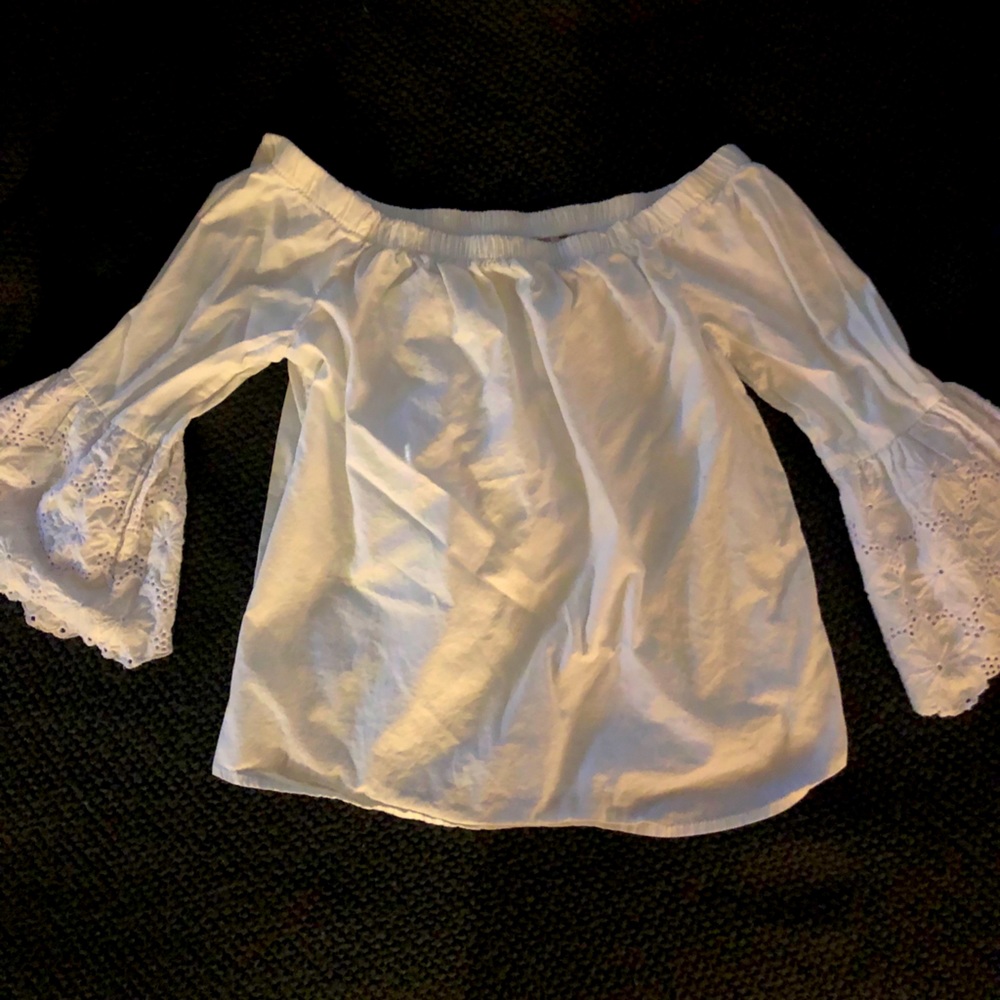 Off the shoulder white blouse.